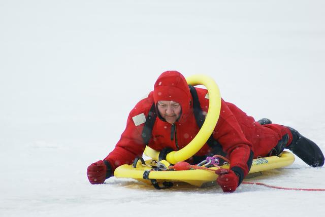 SLVFD Lieutenant Tim Donaldson works his way across thin ice to rescue his victim  &quot;Lifeguard Systems, Surface Ice Rescue Training 1/8/2012&quot;